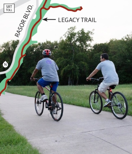 Bicyclists in Plano ride along the recently completed Legacy Trail extension. (Liesbeth Powers/Community Impact Newspaper)