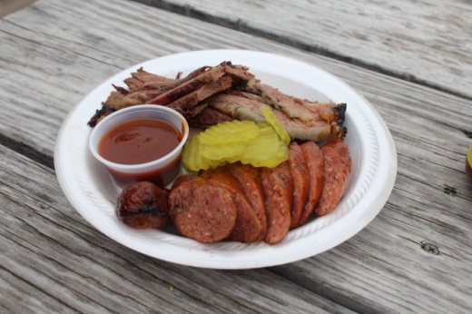 Dannys BBQ sells beef and sausage sandwiches along with combination plates that include brisket, pork ribs and sausage. (Elizabeth Ucles/Community Impact Newspaper)