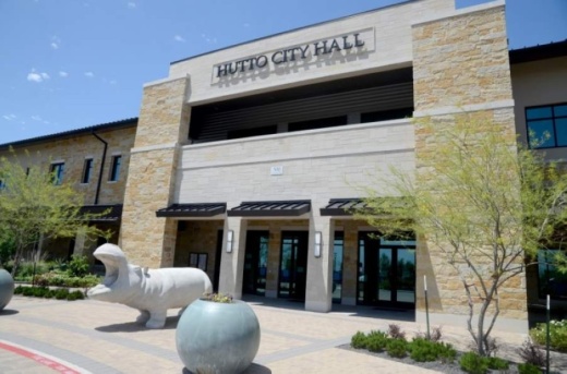 Online payment options and curbside services will continue, while reduced capacity and face masks will be required for in-person visits. (Kelsey Thompson/Community Impact Newspaper)