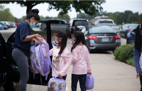 Students are dropped off at Weatherford Elementary School on Sept. 9, the first day of in-person learning. (Liesbeth Powers/Community Impact Newspaper)