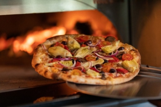 Straying from traditionals like cheese and pepperoni, Tony C's serves specialty pies such as eggplant, prosciutto and goat cheese, and the Truffle Shuffle. (Courtesy Tony C's Pizza & Beer Garden)
