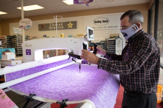 Rickey Whitaker worked at the Plano Sewing Center for seven years under his mother before becoming the owner in 2009. (Liesbeth Powers/Community Impact Newspaper)
