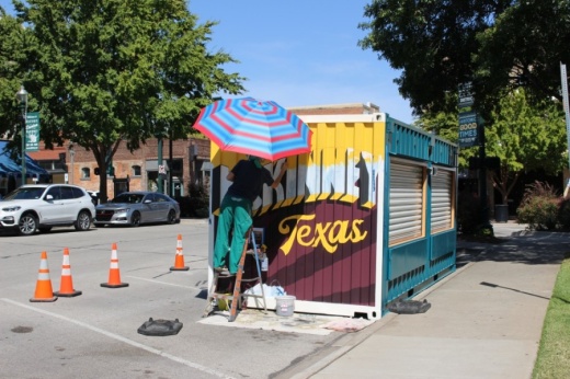 A local artist customized McKinney's new box from Better Block in a Box. (Miranda Jaimes/Community Impact Newspaper)