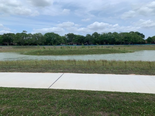 Phase 2 of Exploration Green features a 26.2-acre detention pond, 18 acres of natural habitat with wetlands and 1.3 miles of trails. (Courtesy of LAN)