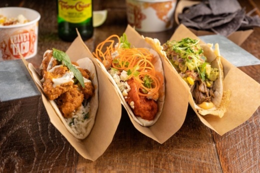 The Dallas-based restaurant serves more than 20 varieties of globally inspired tacos, such as the spicy tikka chicken, the buffalo chicken and the slow-roasted brisket. (Courtesy Velvet Taco)