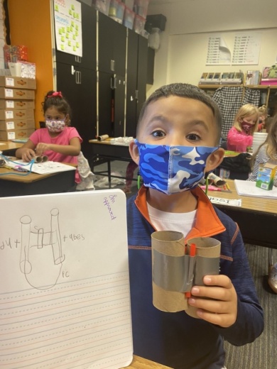 Lane Graham at Hall Elementary shows off the observer he made in engineering lab. (Courtesy Clear Creek ISD)