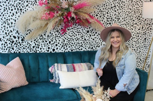 Laci Coker, founder of The Darling Co., a wedding cooperative located near Main Street, is one of the newest tenants in the Richardson Core District. (Olivia Lueckemeyer/Community Impact Newspaper)