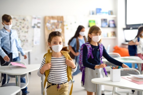 Students and staff who show symptoms while at school will be able to get tested for the coronavirus. (Courtesy Adobe Stock)