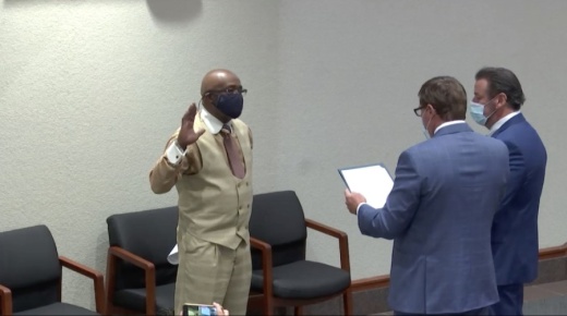 Chris Thornton is sworn into the McKinney City Council Dec. 1 to fill the vacancy for the District 1 seat. (Screenshot by Miranda Jaimes/Community Impact Newspaper)