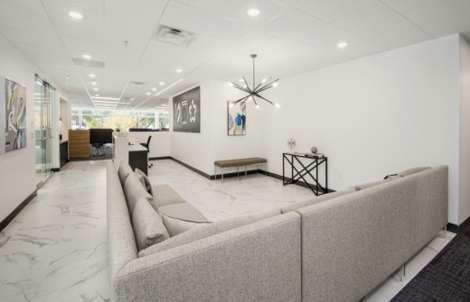 The facility, located at 5560 Tennyson Parkway, Ste. 100, includes office space, conference rooms, a video and photo studio, and a shaded outdoor courtyard. (Courtesy Versatile Imaging)