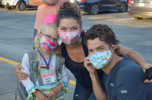 Hoffmann Lane Elementary School student Charlee Priddy is pictured with her parents, Kari and Scottie Priddy, on the first day of school in 2020. (Courtesy Comal Independent School District)