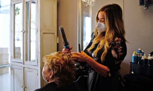 At The Salons at University Oaks, stylist Kristin DeMotta said her relationships with clients continually remind her why she pursued this career. (Kelsey Thompson/Community Impact Newspaper)