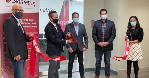 Officials with Sigmetrix and the McKinney Economic Development Corp. cut the ribbon at the company's new headquarters in McKinney on Dec. 9. (Courtesy Sigmetrix)