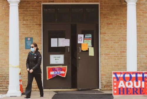 A voter at Lions Municipal Golf Course. (Christopher Neely/Community Impact Newspaper)