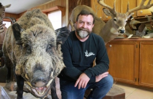 Barrett Simpson runs Conroe Taxidermy with his two brothers. (Andy Li/Community Impact Newspaper)