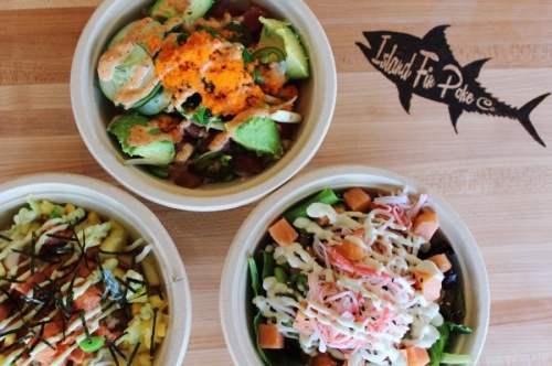 The Hawaiian-style restaurant allows patrons to create their own poke bowl by choosing from eight proteins, more than 25 toppings, house-made sauces and specialty mix-ins. (Courtesy Island Fin Poke Co.) 