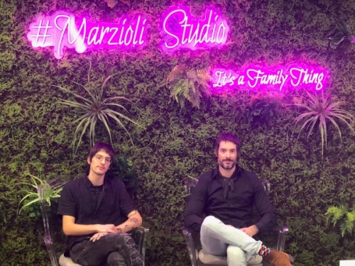 Josiah Marzioli (left) and Joesph Marzioli (right) pose at the newly opened Marzioli Studio. (Courtesy Giant Noise Public Relations)