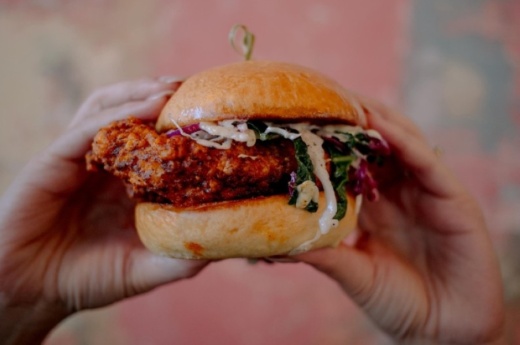 The Austin-based eatery's menu is inspired by Nashville hot chicken; offerings include chicken bites, jumbo tenders, chicken sandwiches, macaroni and cheese, collard greens and homemade pies. (Courtesy Tumble 22)