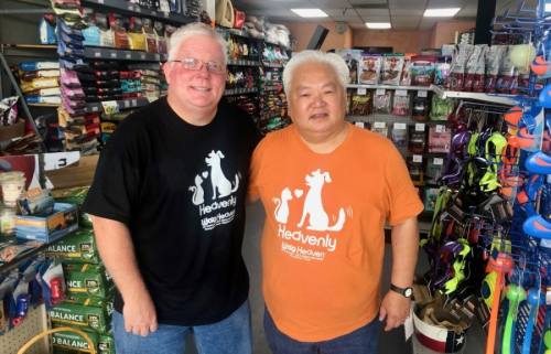 Jeff Manley (left) and Jusak Yang Bernhard own both Wag Heaven locations, the second of which opened downtown in 2020. (Sally Grace Holtgrieve/Community Impact Newspaper)
