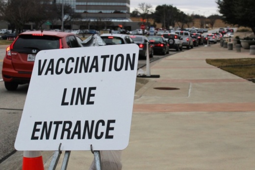 Tarrant County residents wait in line to receive their vaccine dose at the Hurst Conference Center on Jan. 19. (Sandra Sadek/Community Impact Newspaper)