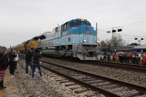The No. 4141 locomotive, designed by the Union Pacific Railroad Corp. to match Air Force One in 2005, traveled through the North Houston area in December 2018 carrying the body of President George H.W. Bush to College Station. (Anna Lotz/Community Impact Newspaper)
