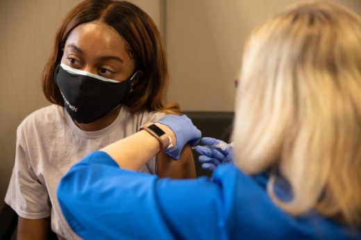 woman being vaccinated