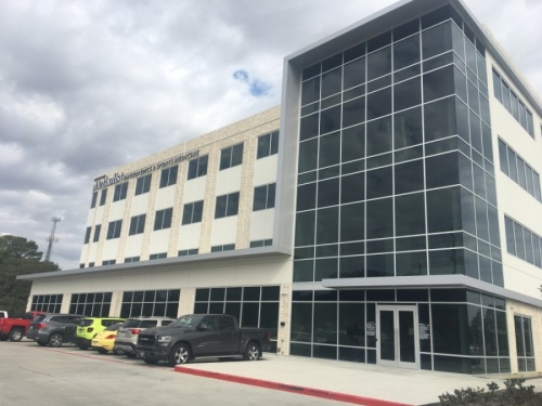 Tannos' four-story building on South Friendswood Drive will house medical practices, a law firm, a research company and more. (Haley Morrison/Community Impact Newspaper)