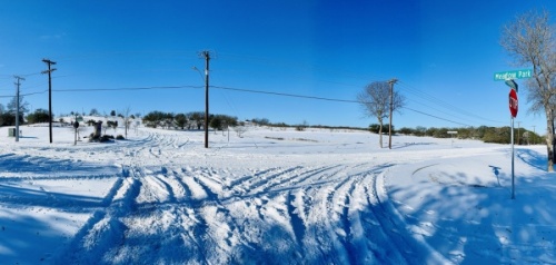 McQueeny Road is shown covered in snow in New Braunfels. (Rachal Russel/Community Impact Newspaper)
