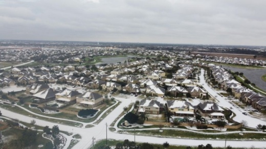 Streets of the MarBella neighborhood are snowy, as seen from above the morning of Feb. 15. (Courtesy Rico Daniels)