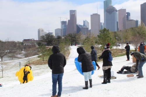 Parkgoers brought inner tubes to Buffalo Bayou Park for sledding