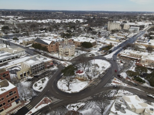 Downtown New Braunfels is blanketed in snow. (Warren Brown/Community Impact Newspaper)