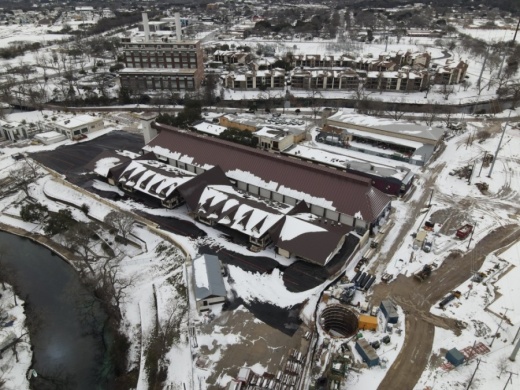 The newly rebuilt Wursthalle at Wurstfest is covered in snow, Feb. 16, 2021. (Warren Brown/Community Impact Newspaper)