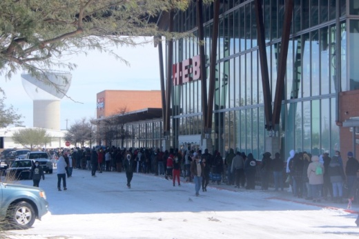 Customers wait in line at the H-E-B in East Austin's Mueller development on Feb. 16. The grover opened its Central Texas stores on a limited schedule and many customers waited hours to get inside. (Jack Flagler/Community Impact Newspaper)