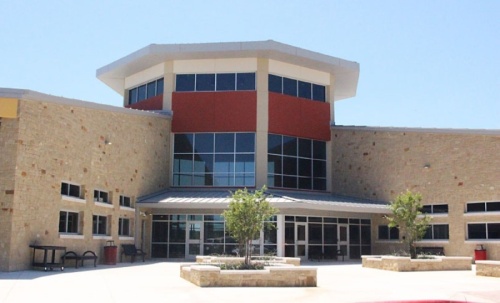 Lake Travis ISD students can obtain packaged breakfast and lunch at Bee Cave Middle School on Feb. 22. (Amy Rae Dadamo/Community Impact Newspaper)