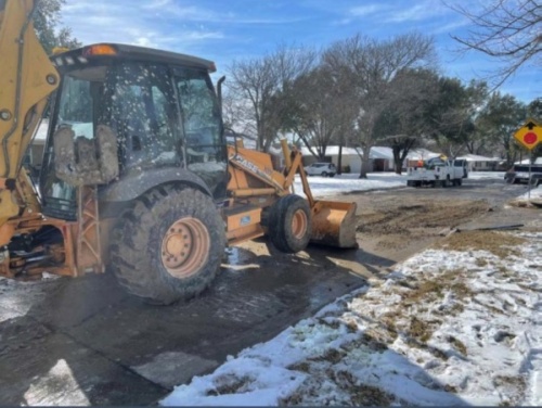 Bulldozers clear debris from the streets of Richardson following the winter storm. (Courtesy city of Richardson)