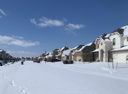 Pflugerville streets were covered with snow from Winter Storm Uri during the week of Feb. 15. (Amy Bryant/Community Impact Newspaper)