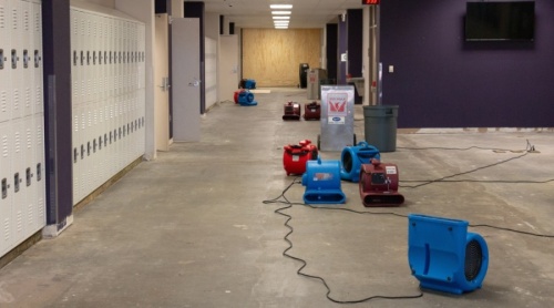The carpet in a hallway at Humble High School was quickly removed due to a sprinkler head that froze and burst during the winter storm. (Courtesy Humble ISD)