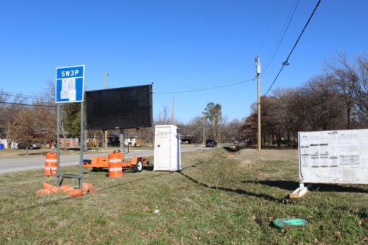 Construction notification signs next to Cheek-Sparger Road