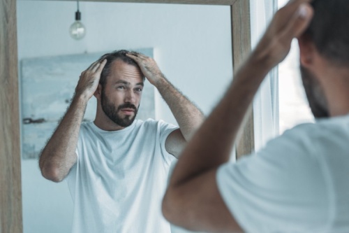Hair Enhancement Centers offers treatments that help with hair loss and hair growth. (Courtesy Adobe Stock)
