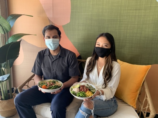 Restaurant General Manager Abdiel Rodriguez and Haus Group business partner Jane Ko sit in one of the shared spaces for Me So Poke and Tea Haus. (Photos by Greg Perliski/Community Impact Newspaper)