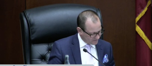 Conroe Mayor Jody Czajkoski reads the agenda item regarding the purchase at a March 11 City Council meeting. The item was discussed during executive session. (Screenshot via Conroe City Council livestream)