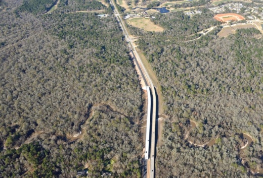 The newly constructed bridge provides four lanes of north and south access along the Fish Creek Thoroughfare. (Courtesy Woodforest)