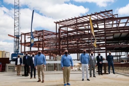 Representatives for PGA of America, Cushman & Wakefield, Adolfson & Peterson and Page gathered to celebrate the midpoint of construction for the new PGA of America corporate headquarters in Frisco, Texas. From left: Alana Liane, Page; Jeff Hansen, Adolfson & Peterson Construction; Kyle Bramlett, Cushman & Wakefield; Don Rea, PGA of America; Jim Richerson, PGA of America; John Lindert, PGA of America; Brad Blankenship, Cushman & Wakefield; Granger Hassmann, Adolfson & Peterson Construction; and James Tanner, Page. (Courtesy PGA of America)
