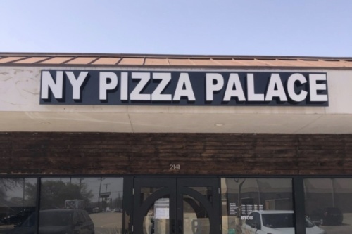 Current menu options, including specialty white spicy chicken and Greek pizzas, are expected to move over with NY Pizza Palace to its new location at 2141 W. Park Blvd., Plano, where Fino Italian Bistro was previously. (Community Impact Newspaper staff)