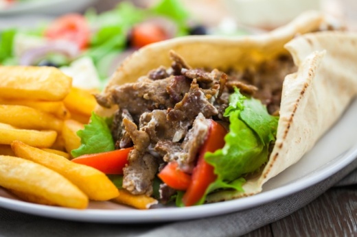 The Mediterranean fast-food concept will offer signature shawarma rolls and rice bowls in varying degrees of spice levels. (Courtesy Adobe Stock)