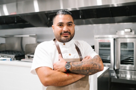 Photo of a male chef with crossed arms