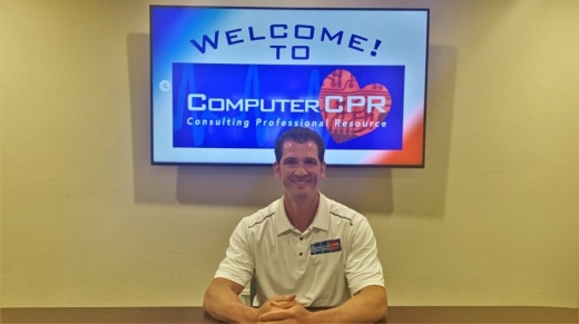 man sitting at table