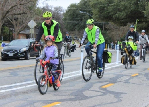Residents ride bikes on Shoal Creek Boulevard in this photo from February 2020. Austin Water is taking on a project to replace water and wastewater lines in the Allandale neighborhood. (jack Flagler/Community Impact Newspaper) 