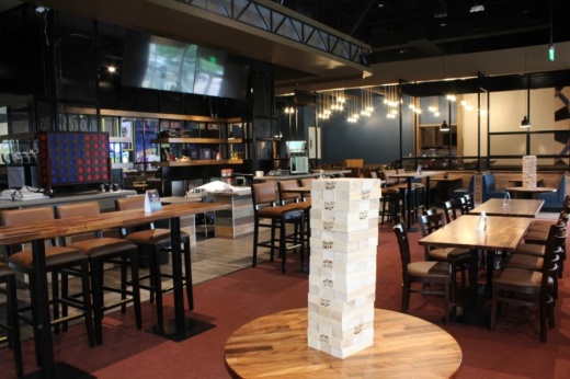 REVL Social Club offers bar food and cocktails with games such as Jenga and Connect 4 for guests to use. (Megan Cardona/Community Impact Newspaper)