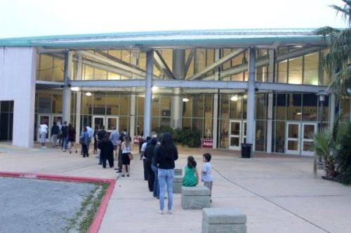 Early voting for Travis County's May 1 local elections opened April 19. In this file photo, voters line up ahead of the 2020 primary elections at Millennium Youth Entertainment Complex in East Austin. (Jack Flagler/Community Impact Newspaper) 